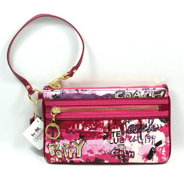 coach wristlets wall