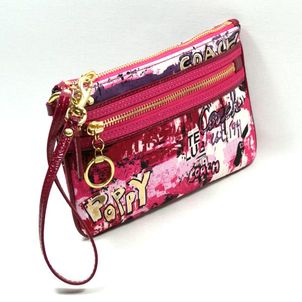 coach wristlets wall