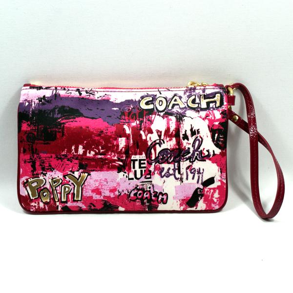 coach wristlets wall