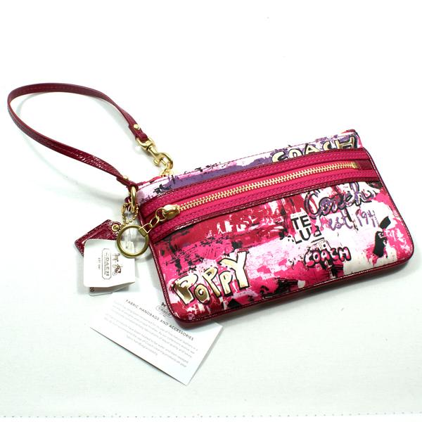 coach wristlets wall