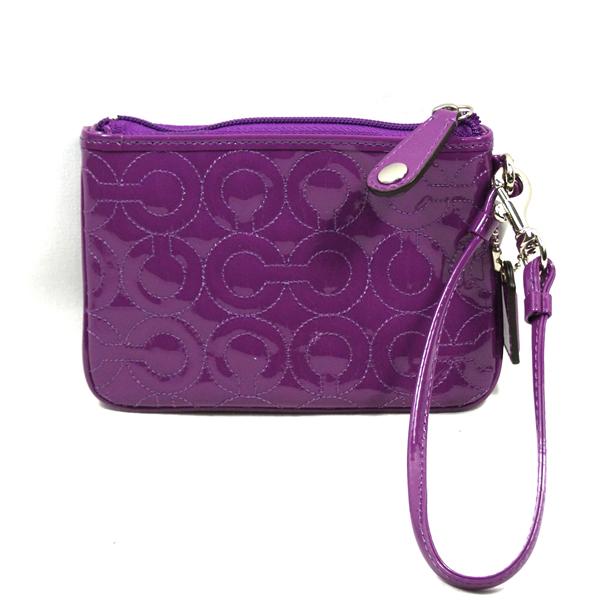 purple coach wristlets