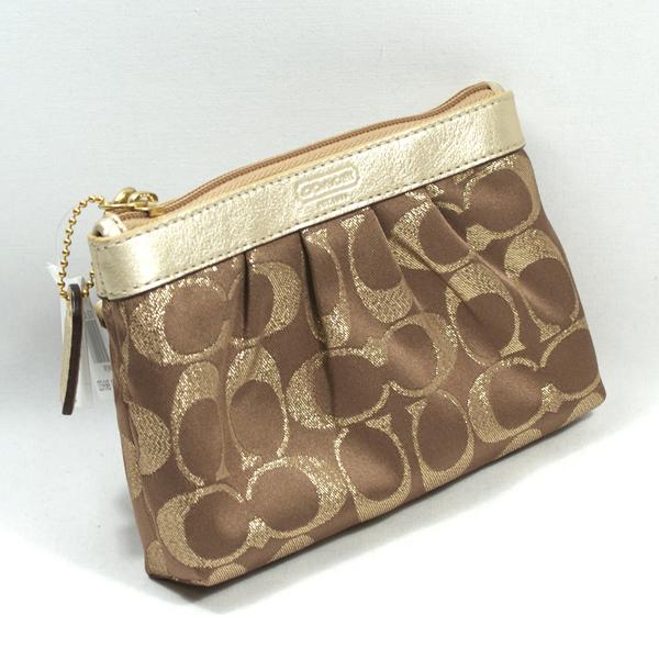 coach wristlets gold