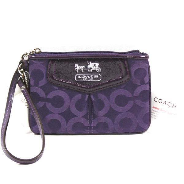 purple coach wristlets