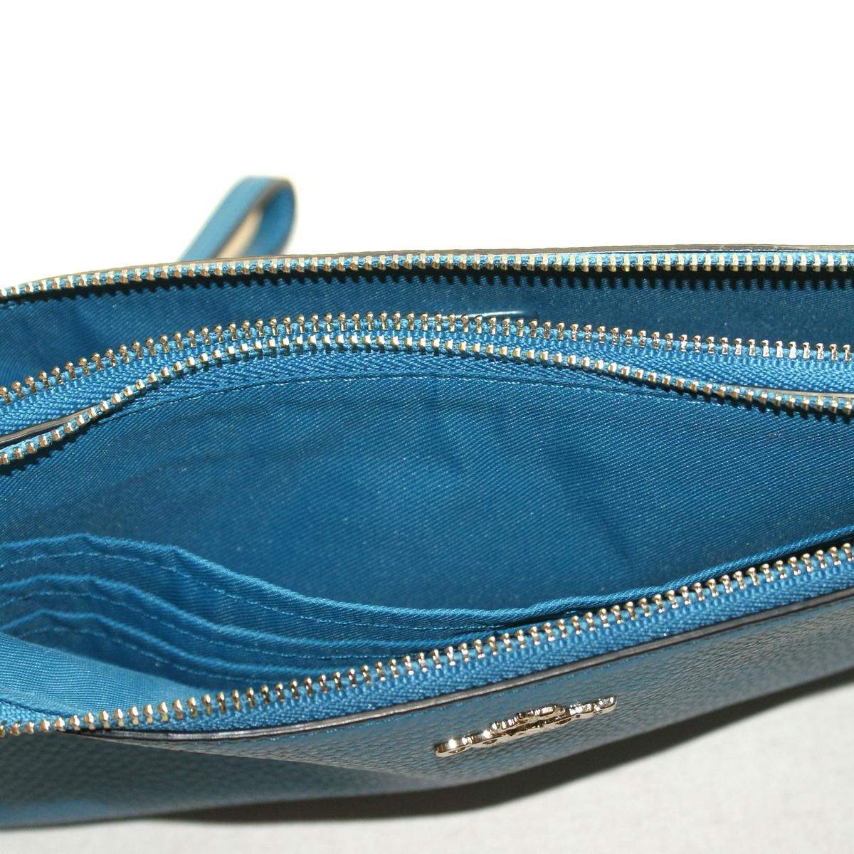 coach computer sleeve